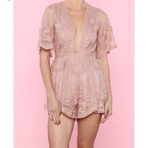 Mauve pink low-cut lace romper